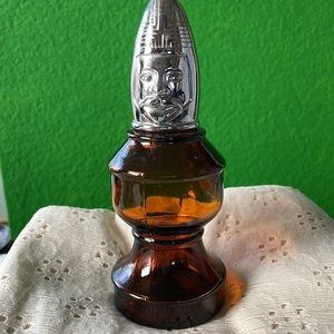 Bronze and silver Avon Knight bottle